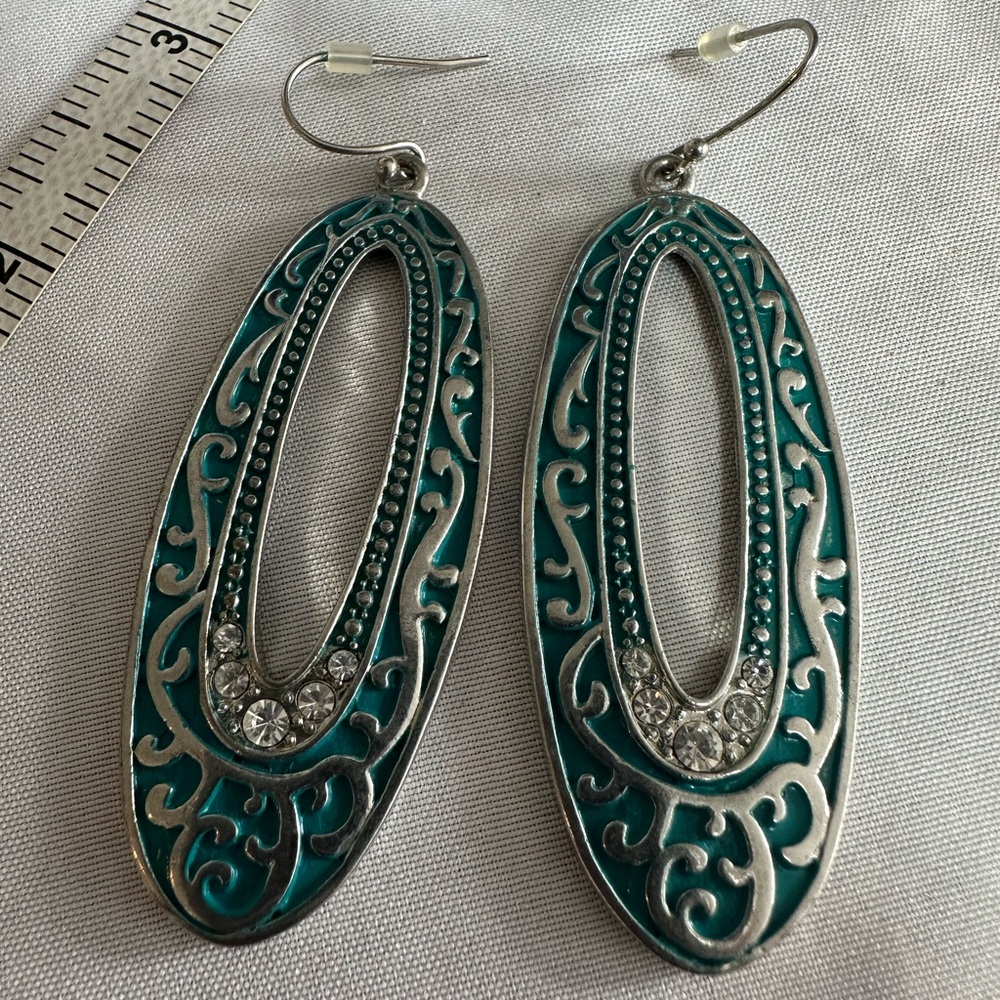Oval silvertone turquoise blue inlaid earrings